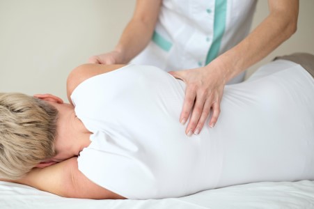 Female patient undergoing physical therapy